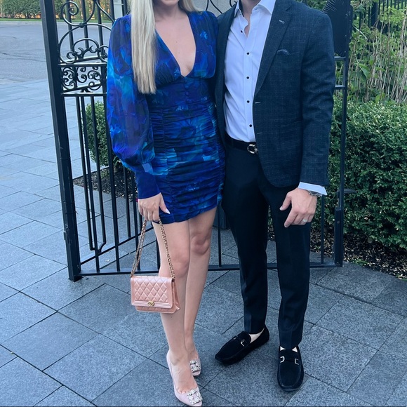 Royal blue floral,V-neckline,long puff sleeves with buttons on the cuffs. - Picture 6 of 6